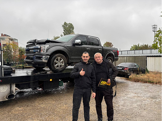 BIBI Cars team with imported truck